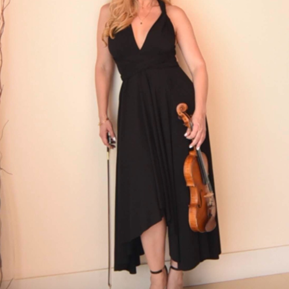 Backless, full skirt asymmetrical maxi black dress